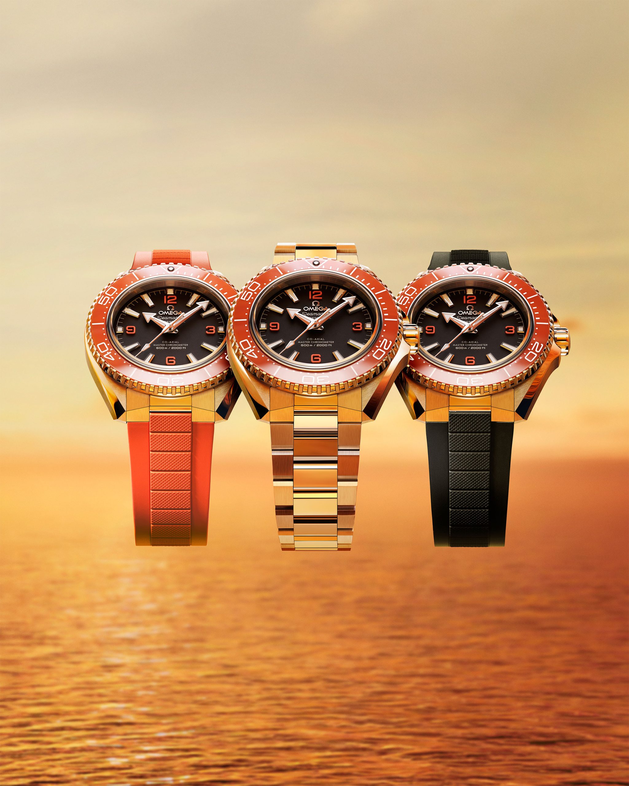 Tres versiones naranja del Omega Planet Ocean